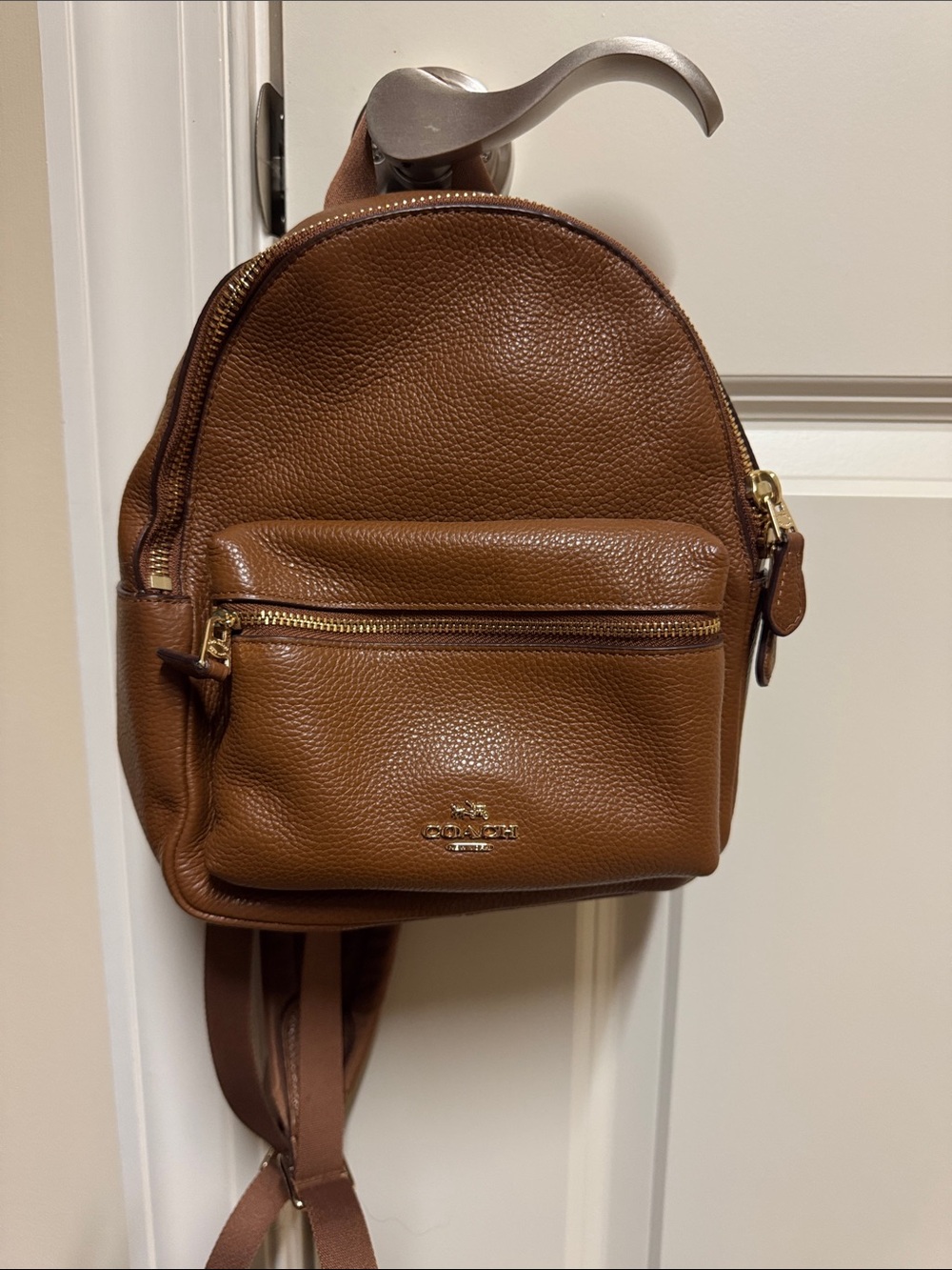 Coach “Mini Charlie” Cognac Pebbled Leather Mini Backpack